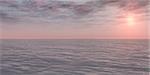 Pink Sunrise over the ocean. Soft Sunlight. Calm weather.