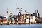 An industrial shipping dock on the sea