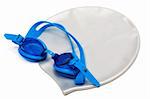 Glasses and cap for swimming on a white background