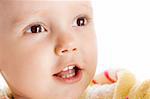 Closeup portrait of a cute brown-eyed child, isolated