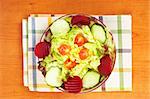 Mediterranean salad with lettuce tomatoes cucumber and beet