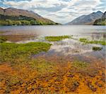 A photography of the scottish highlands lakes