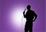 There is a silhouette of the person holding a microphone and singing song