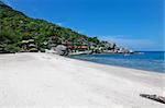 beautiful white sand bay with coral reefs on koh tao - thailand