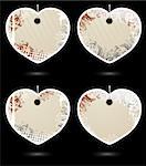 Set of vector beige heart-shaped grunge labels