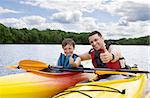 Father and son enjoying kayaking