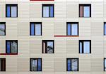 Modern windows mosaic in contemporary modular facade system