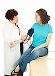 Teenage girl visiting her physician for a checkup.  The doctor is taking her blood pressure.