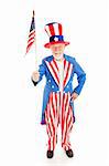 American icon Uncle Sam holding a US flag.  Full body isolated.