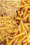Four different kinds of italian pasta. Food background.
