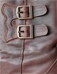 Two metal buckles on a product from a leather