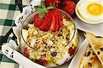 Healthy and hearty breakfast of muesli, strawberries and eggs.