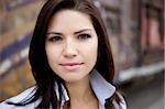 A Beautiful Brunette in a collared shirt with an edge