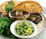 Large field mushrooms with toast and herbed butter.