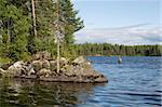 Landscape of Karelian lake and sky with clouds