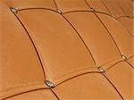 Soft covering of the artificial leather fastened ribbons
