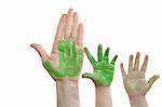Green paint mother, son daughter hand together over white background