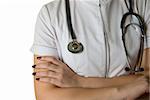 Closeup of white nurse uniform and stethoscope isolated on white