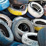 pile of old colored tires