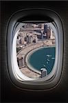 aeroplane window with dubai marina view