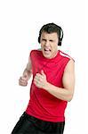 Young handsome man running, jogging red shirt over white background