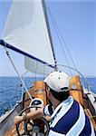 Sailor sailing in the sea. Sailboat over mediterranean blue saltwater