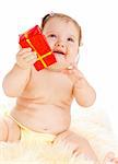 Baby girl giving a red present box