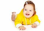 Laughing baby girl in yellow clothing