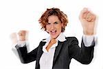 Successful business woman in charge and excited, with her arms up in the air and her fists clenched, ready to take on any obstacle.