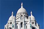 The Sacre Coeur - famous cathedral and popular touristic place in Paris, France