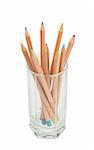 Set of multicolored wood pencils in glass. Close-up. Isolated on white background.