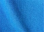 folded blue denim clothes fragment as a background