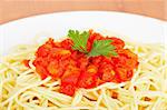 Freshly cooked plate of spaghetti with tomato sauce just for eating. Shallow depth of field