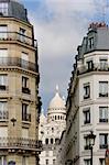 The Sacre Coeur viewed from the Boulevard de Rouchechouart in Paris, France