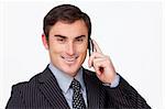 Portrait of an attractive young businessman on phone against white