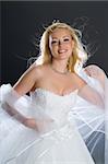 Young blonde woman in a wedding dress