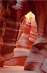 Red stone bear looking at the moon in Antelope Canyon