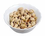 Pistachios on a plate on a white background, isolated