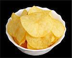 Potato chips in a white cup on a black background, isolated