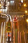 prague - high angle view of traffic on cechuv bridge at dusk