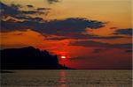 Sea sunrise. View of the Kara Dag Mountain. Black Sea. Crimea.