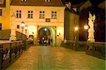 night photo of Bratislava famous historic landmark - Michael's gate (slovak: Michalska brana)