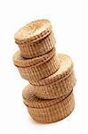 Stack of Various Sized Wicker Baskets Isolated on White.