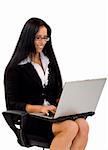 businesswoman in chair with laptop computer over white