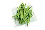 Plate of Green Beans on White Background