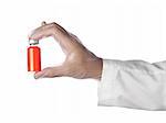 A doctor holds a vial full of red liquid with his latex gloves on. Isolated on white.