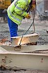 demotion worker using oxy acetylene burner on construction site