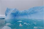 Iceberg and azure water in Antarctica