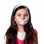 little girl with no voice, tape covering her mouth