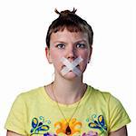 Young woman with tape across her mouth, voiceless
